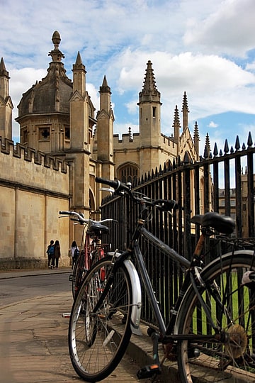 Oxford Summer School, Experience life at the University of Oxford, bike chained up outside Radcliffe camera Bodleian library with view of All Souls college.