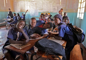 Image shows a somewhat dilapidated classroom in Zambia.